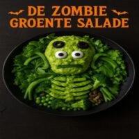 Een knapperige, groen gekleurde salade vol “zombie-energie” – fris, voedzaam en met een spooky twist dankzij de grillige presentatie en groene dressing.